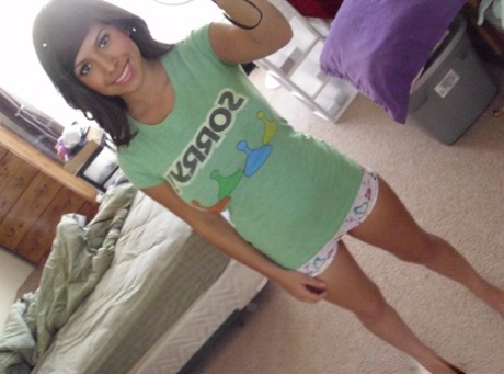 Latina teen Layla Rose takes selfies of her great tits and shaved pussy