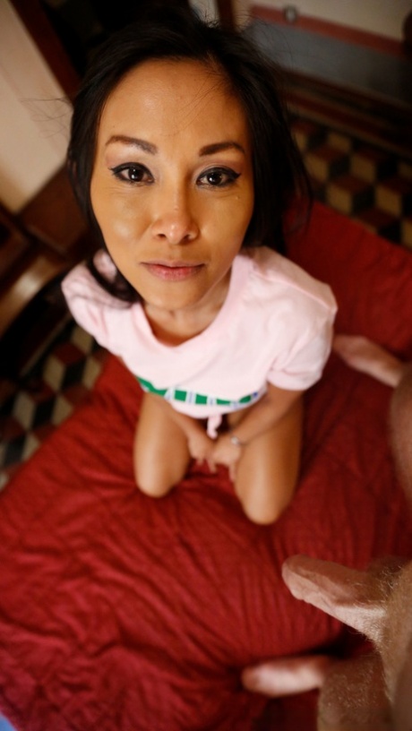 Asian first timer with a juicy butt partakes in hardcore POV sex on a bed