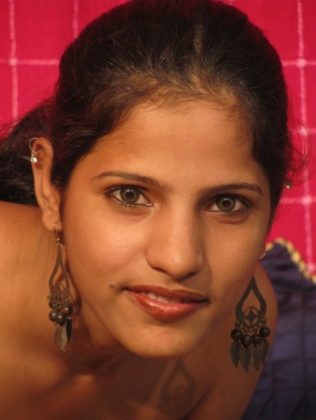 Indian MILF licks and fondles her completely naked body during solo action