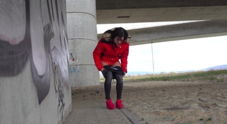 Solo girl Billie takes a badly needed piss underneath an overpass