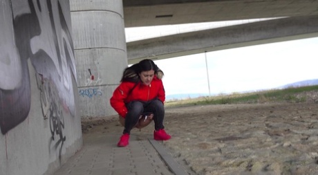 Solo girl Billie takes a badly needed piss underneath an overpass