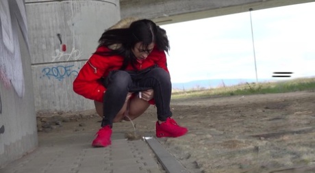 Solo girl Billie takes a badly needed piss underneath an overpass