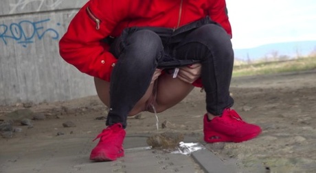 Solo girl Billie takes a badly needed piss underneath an overpass