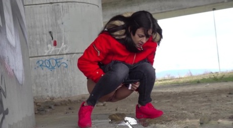 Solo girl Billie takes a badly needed piss underneath an overpass