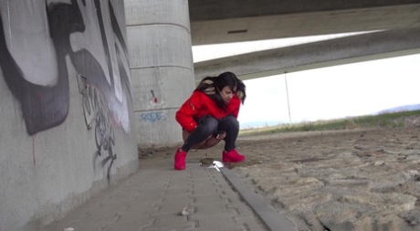 Solo girl Billie takes a badly needed piss underneath an overpass