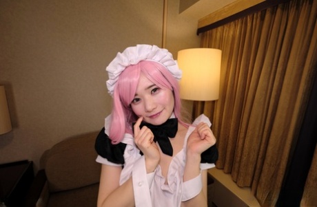 Cute Asian cosplayer Ringo Fujii stretches out her tight pink pussy