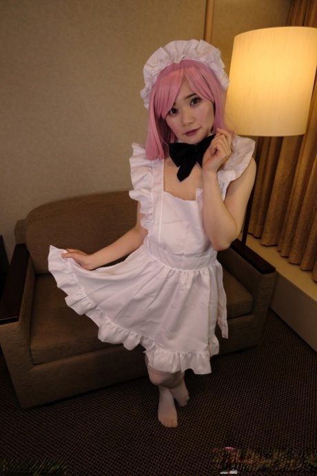 Cute Asian cosplayer Ringo Fujii stretches out her tight pink pussy