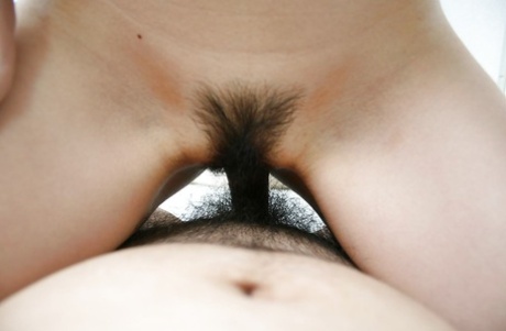 Asian chick Mai Katagiri gets her unshaven cunt cocked up and creampied