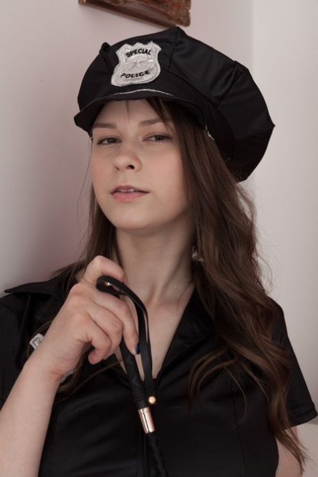 Sexy cop Beata strips her uniform, reveals her big tits & shows her hairy cunt