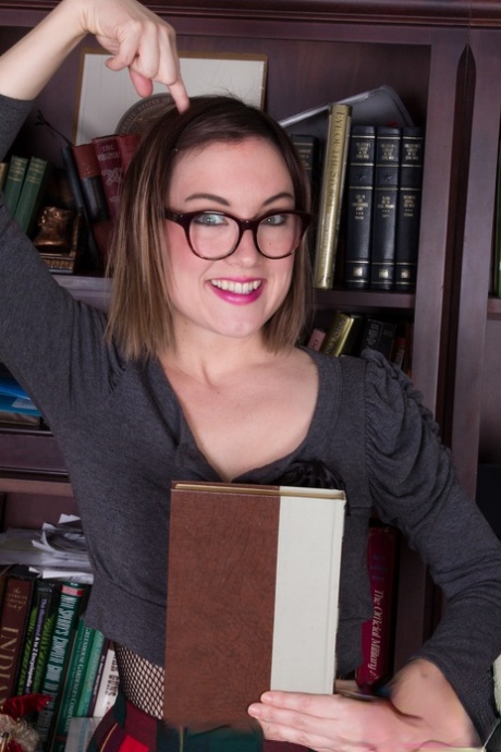 Sexy librarian Ruby Rose strips & shows her inked body and hairy vagina