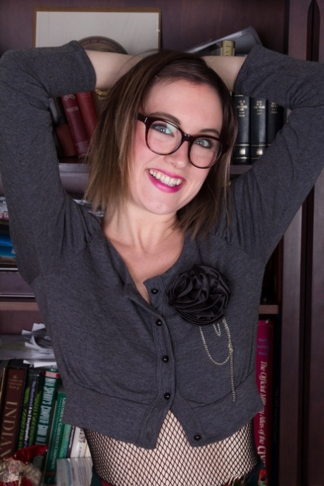 Sexy librarian Ruby Rose strips & shows her inked body and hairy vagina