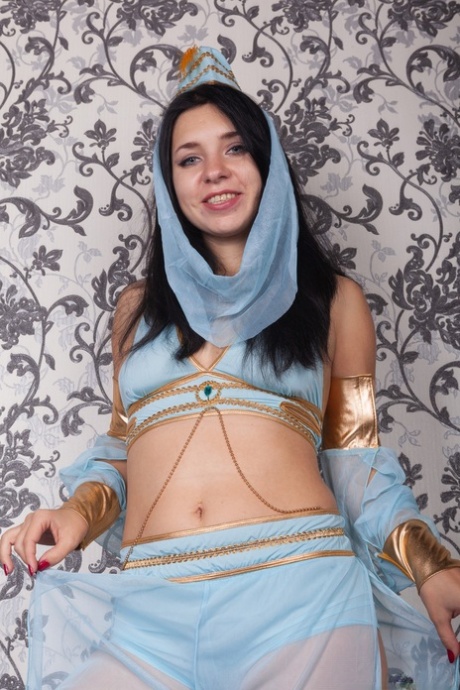 Adorable belly dancer Tanita reveals her hairy crotch and spreads it wide open