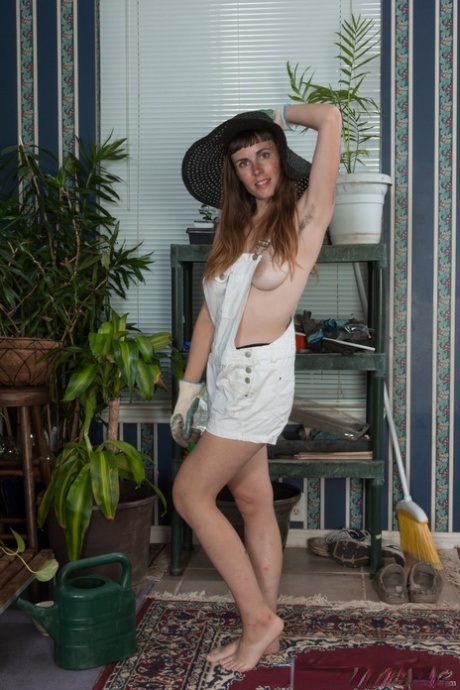 Dirty brunette Leila Larson teases her hairy muff and shows hairy armpits