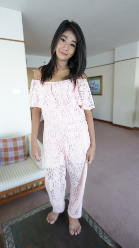 Cute girl from Thailand takes off her clothes to launch nude modeling career