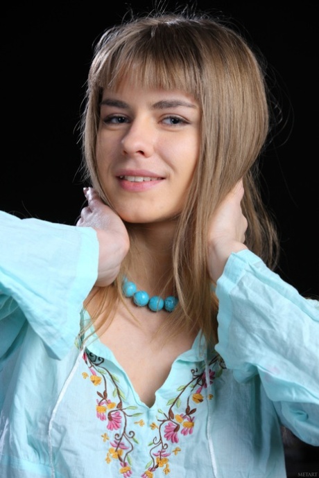 Pretty teen Lalovv A gets naked over a piano in a confident fashion