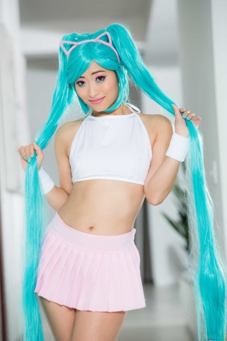 Asian solo girl Ayumu Kase models naked with cosplay inspired hair