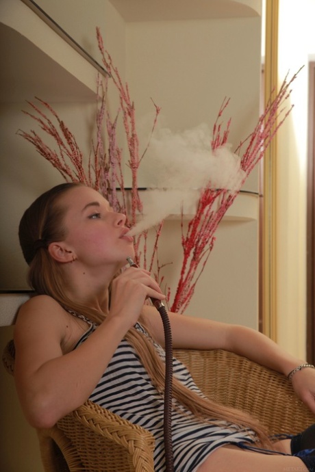 Lusty teen Milena D flashes her hairy pussy in a wool coat & lingerie outdoors