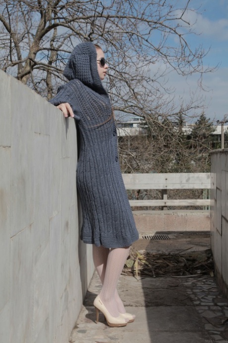 Lusty teen Milena D flashes her hairy pussy in a wool coat & lingerie outdoors