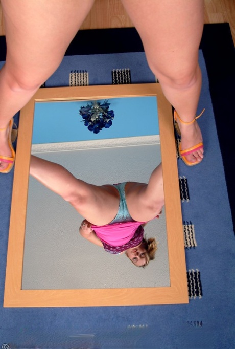 Charming American Jaime toying her cock-hungry pussy above a mirror