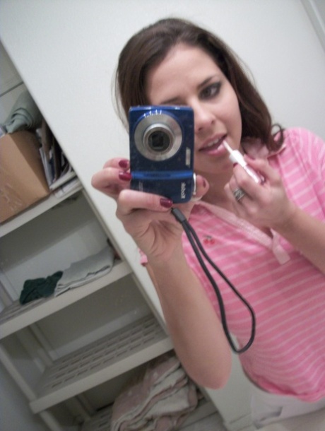 Cute teen amateur Cali Logan poses naked and teases with her nice big tits