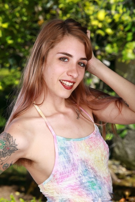 Redheaded Russian hippie Pearl Sage shows her hairy body & pisses outdoors