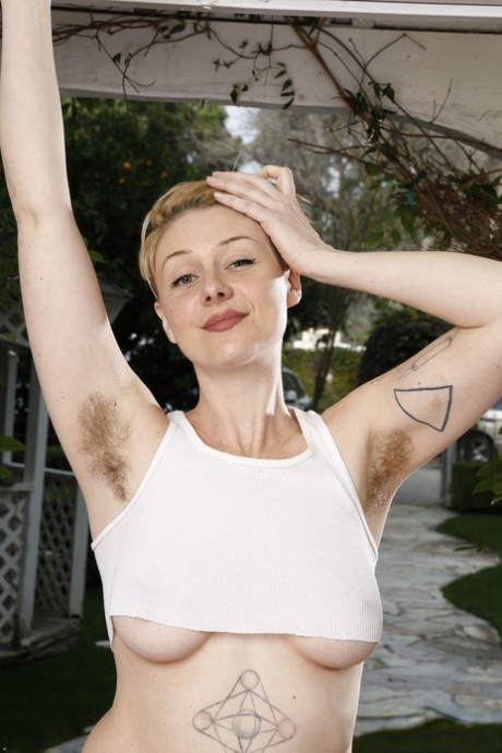 Short-haired MILF Dakota Rose shows her big tits, ass & hairy holes in a solo