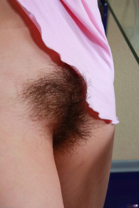 Sexy brunette Clara strips naked & spreads her inviting hairy pussy up close