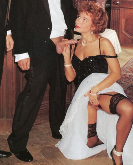 Hot MILF gets a double penetration in a vintage threesome with hung men