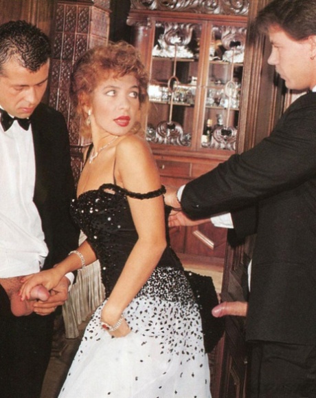 Hot MILF gets a double penetration in a vintage threesome with hung men