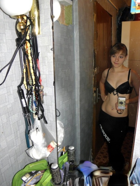 Hot teen with natural tits undresses and takes sexy homemade selfies