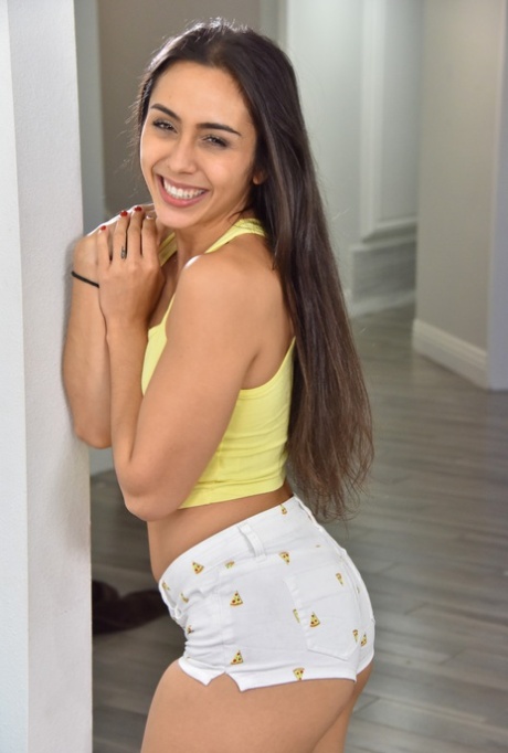 Beautiful amateur teen Lilly Hall gets rid of her clothes & spreads her pussy
