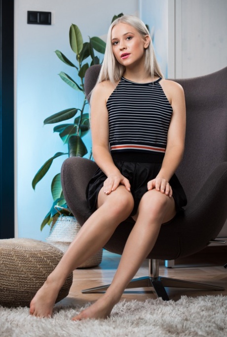 Platinum blonde secretary Nikki Hill strips & reveals her hot pussy and feet