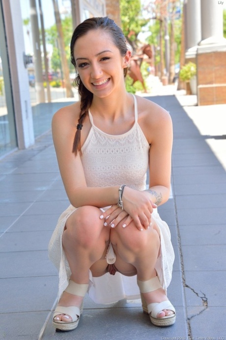 Angelic babe Lily doffs her cute white dress to show her petite body in heels