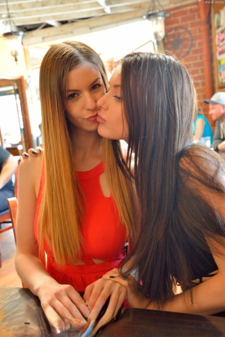 Filthy teens Lana and Stella strip and ride a huge rubber dildo